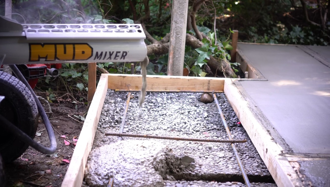 Concrete foundation preparation showing quality base materials and rebar